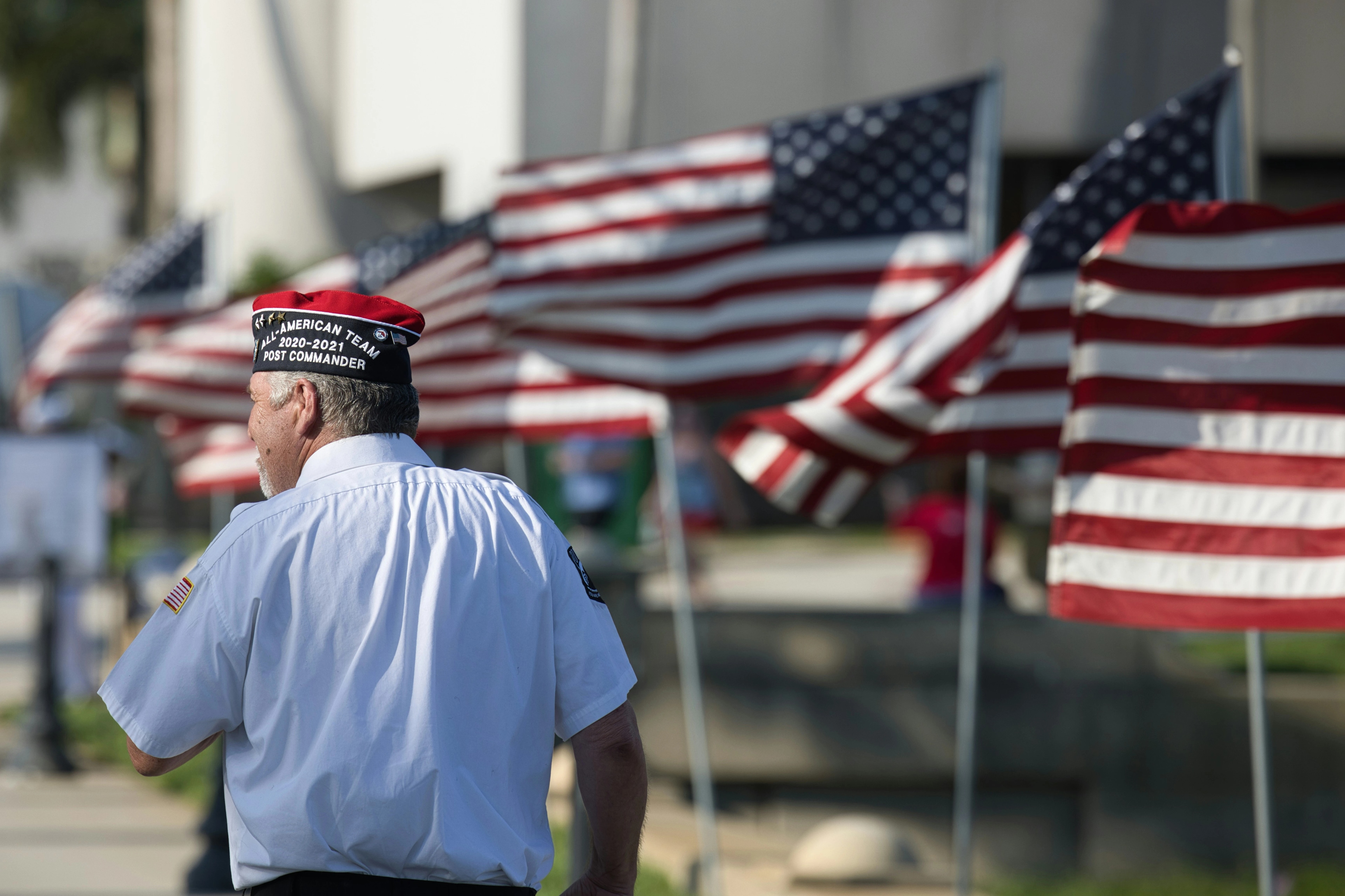U.S. service member in uniform saluting, representing military and veteran financial planning